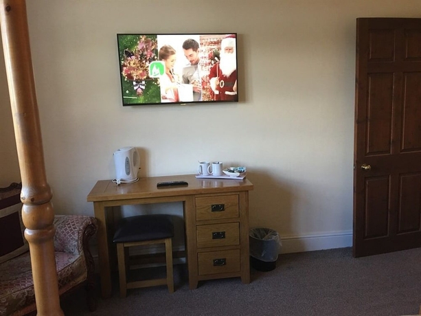 Imagen de la habitación del Hotel The Blazing Donkey. Foto 14