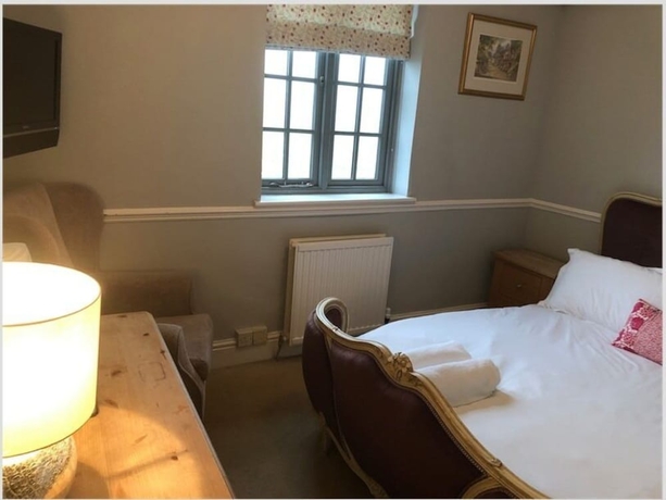 Imagen de la habitación del Hotel The Blazing Donkey. Foto 15