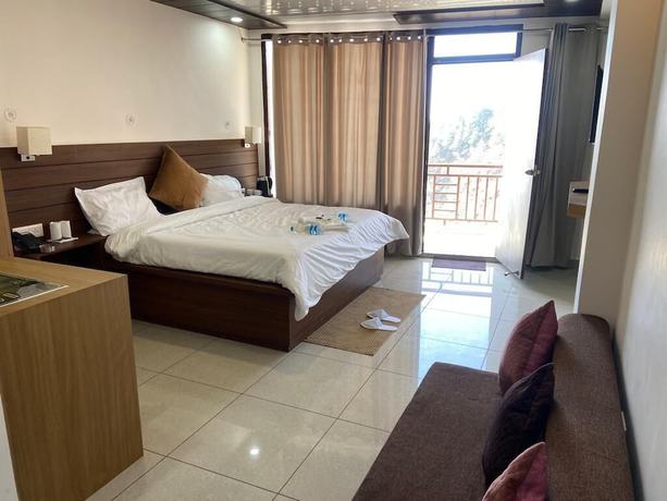 Imagen de la habitación del Hotel The Bliss Dhanaulti. Foto 10