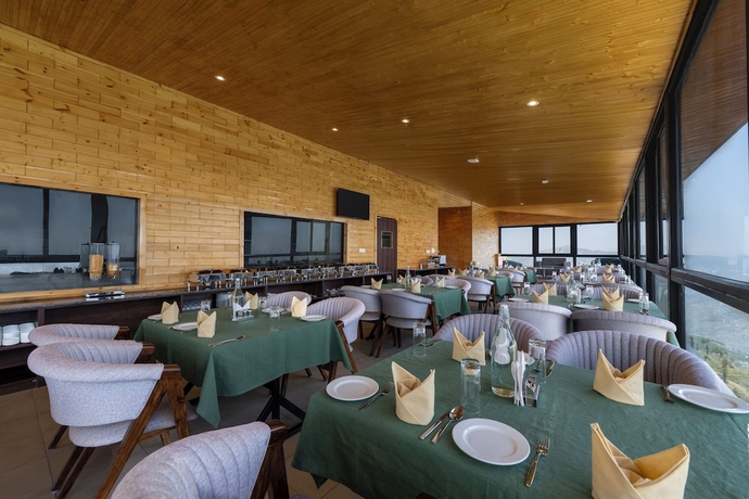 Imagen del bar/restaurante del Hotel The Bliss Kufri. Foto 2