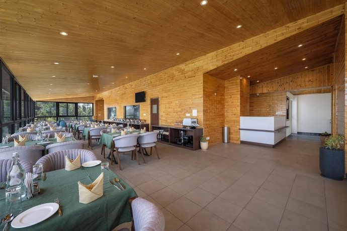 Imagen del bar/restaurante del Hotel The Bliss Kufri. Foto 3