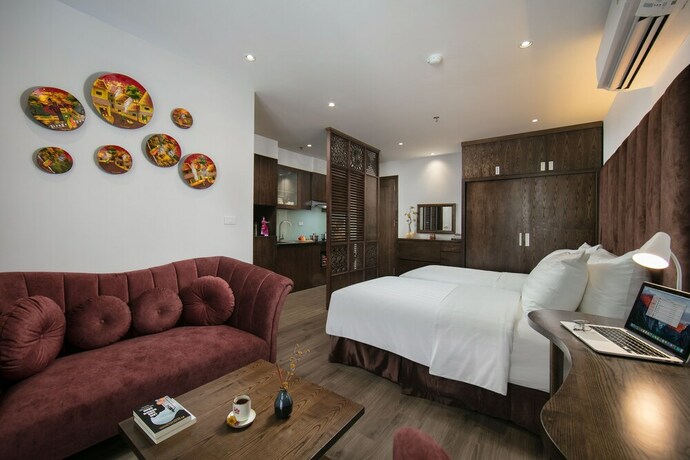 Imagen de la habitación del Hotel The Bloom Ha Noi. Foto 12