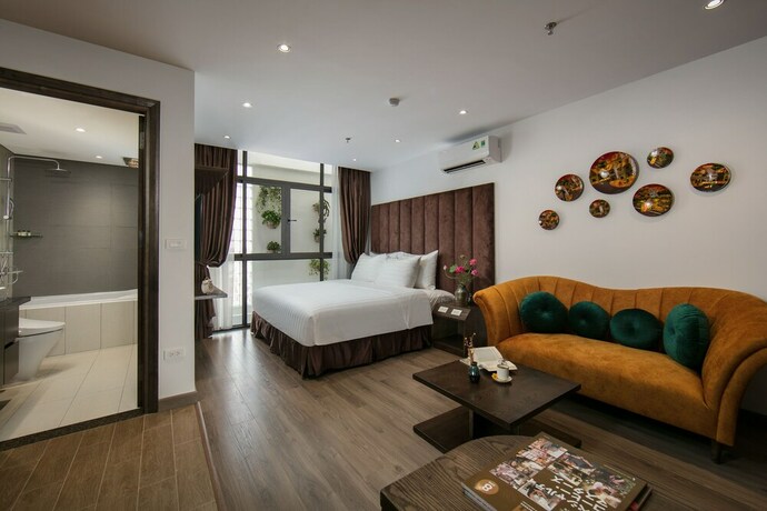 Imagen de la habitación del Hotel The Bloom Ha Noi. Foto 15