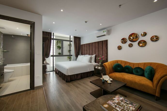 Imagen de la habitación del Hotel The Bloom Ha Noi. Foto 17