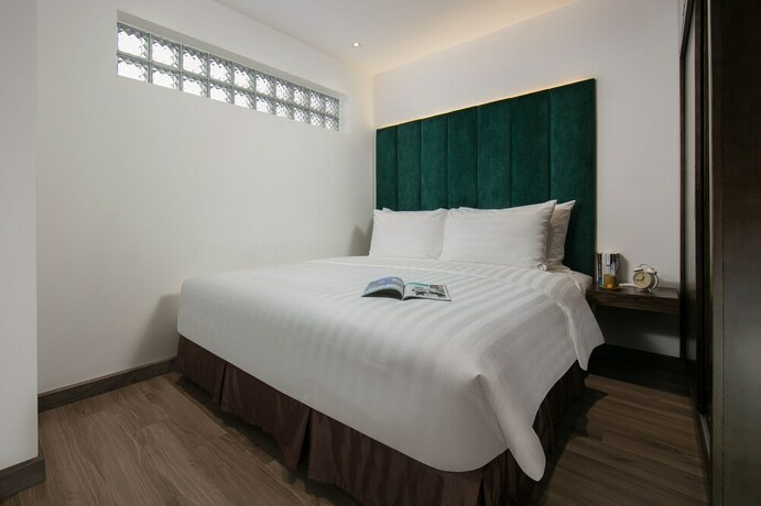 Imagen de la habitación del Hotel The Bloom Ha Noi. Foto 21