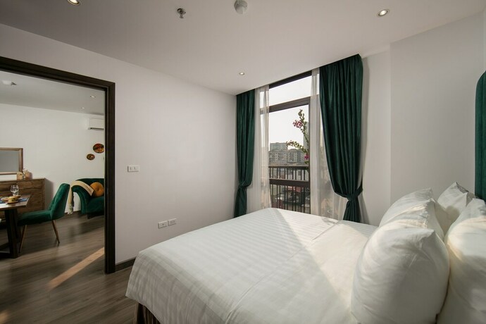 Imagen de la habitación del Hotel The Bloom Ha Noi. Foto 22