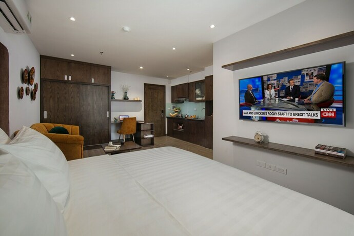 Imagen de la habitación del Hotel The Bloom Ha Noi. Foto 32