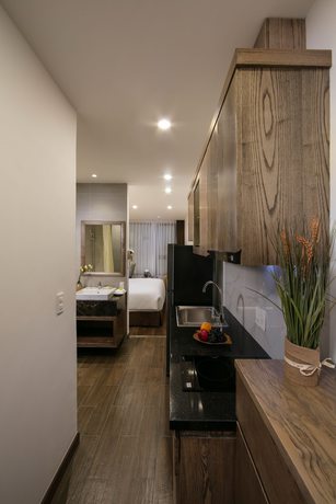 Imagen de la habitación del Hotel The Bloom Pham Viet Chanh - Modern Living Space In Saigon. Foto 2