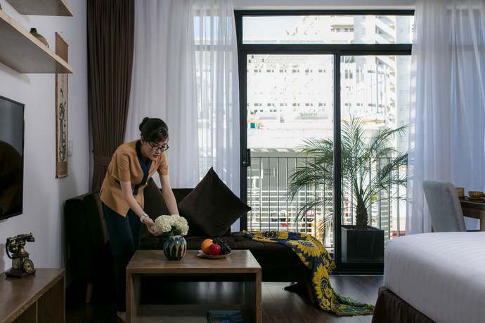 Imagen de la habitación del Hotel The Bloom Pham Viet Chanh - Modern Living Space In Saigon. Foto 14
