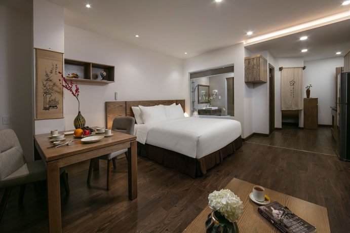 Imagen de la habitación del Hotel The Bloom Pham Viet Chanh - Modern Living Space In Saigon. Foto 16