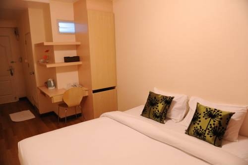Imagen de la habitación del Hotel The Blooms Residence. Foto 3