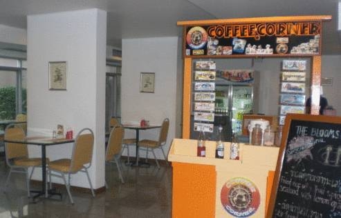 Imagen del bar/restaurante del Hotel The Blooms Residence. Foto 2