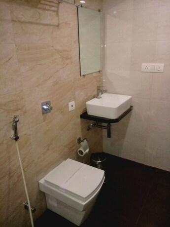 Imagen de la habitación del Hotel The Blossom. Foto 20