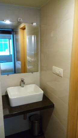 Imagen de la habitación del Hotel The Blossom. Foto 29