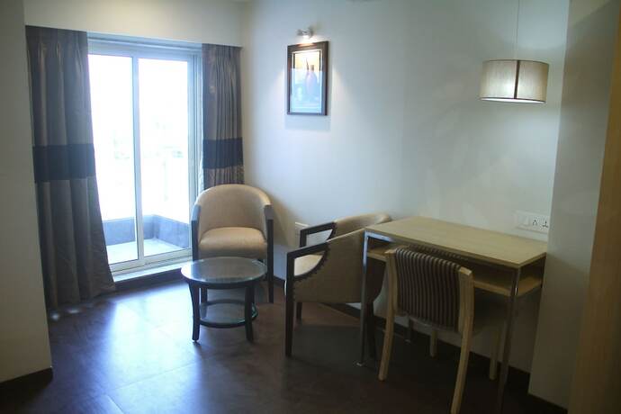 Imagen de la habitación del Hotel The Blossom. Foto 33