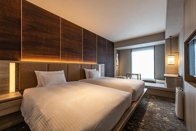 Imagen de la habitación del Hotel The Blossom Hakata Premier. Foto 10