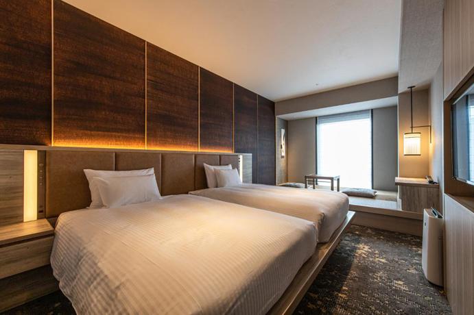 Imagen de la habitación del Hotel The Blossom Hakata Premier. Foto 11