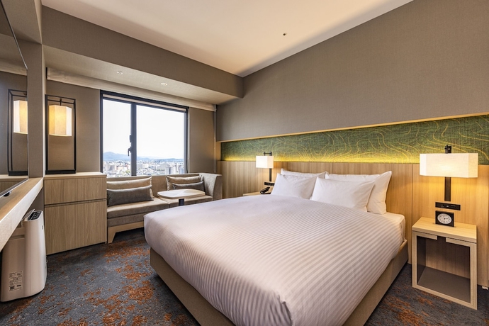 Imagen de la habitación del Hotel The Blossom Kumamoto. Foto 2