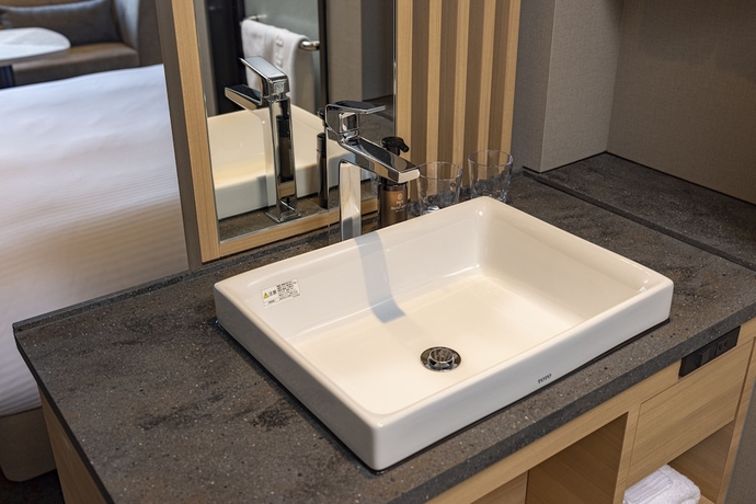 Imagen de la habitación del Hotel The Blossom Kumamoto. Foto 3