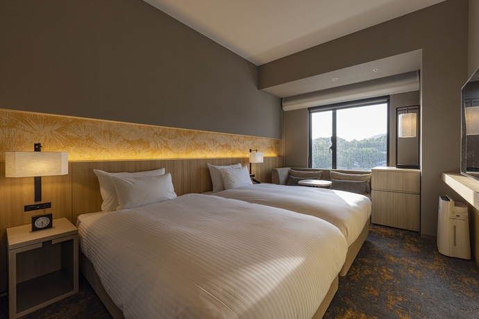 Imagen de la habitación del Hotel The Blossom Kumamoto. Foto 6