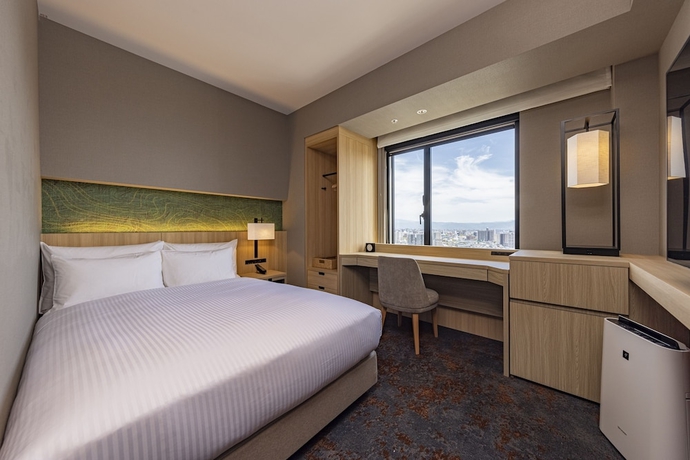 Imagen de la habitación del Hotel The Blossom Kumamoto. Foto 8