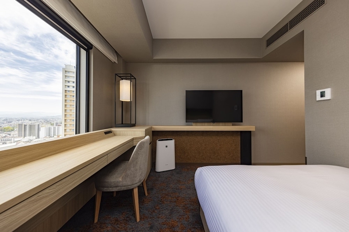 Imagen de la habitación del Hotel The Blossom Kumamoto. Foto 9