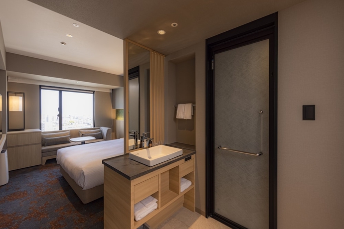 Imagen de la habitación del Hotel The Blossom Kumamoto. Foto 10