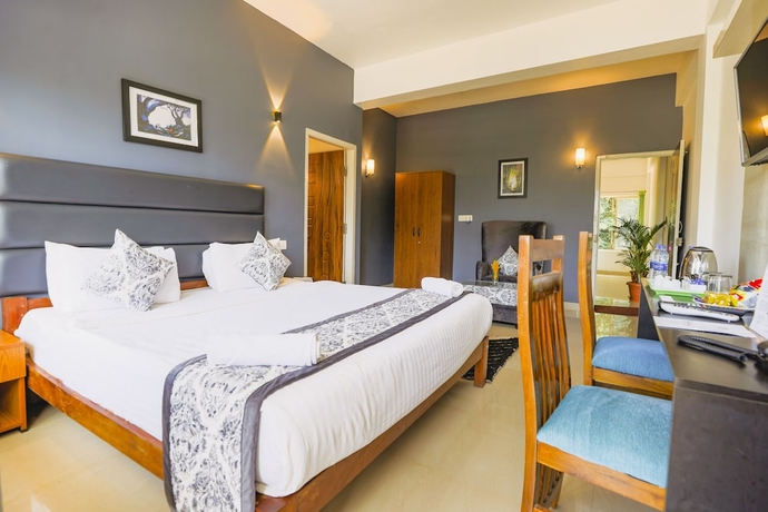 Imagen de la habitación del Hotel The Blossom Resort. Foto 5