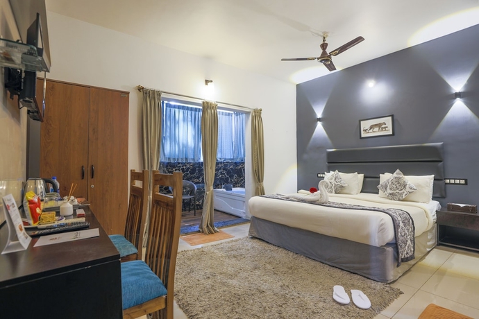 Imagen de la habitación del Hotel The Blossom Resort. Foto 10