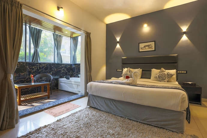 Imagen de la habitación del Hotel The Blossom Resort. Foto 11