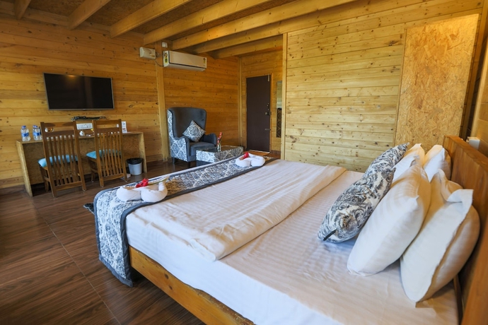 Imagen de la habitación del Hotel The Blossom Resort. Foto 17