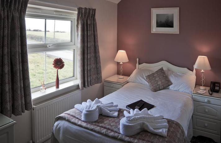 Imagen de la habitación del Hotel The Blue Boar. Foto 10