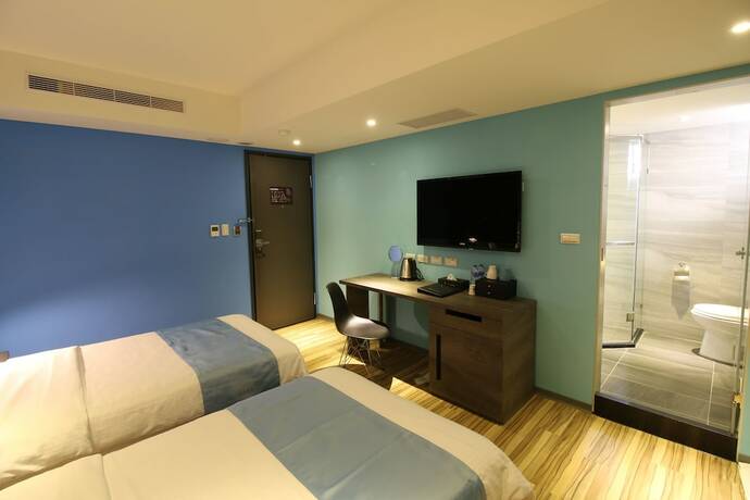 Imagen de la habitación del Hotel The Blue Coast. Foto 21