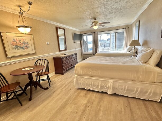 Imagen de la habitación del Hotel The Blue Heron Inn. Foto 14