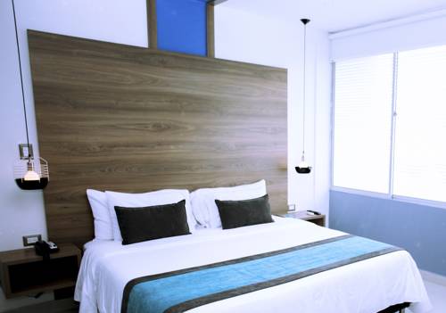 Imagen de la habitación del Hotel The Blue Hotel. Foto 4