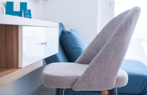 Imagen de la habitación del Hotel The Blue Ivy and Suites. Foto 5