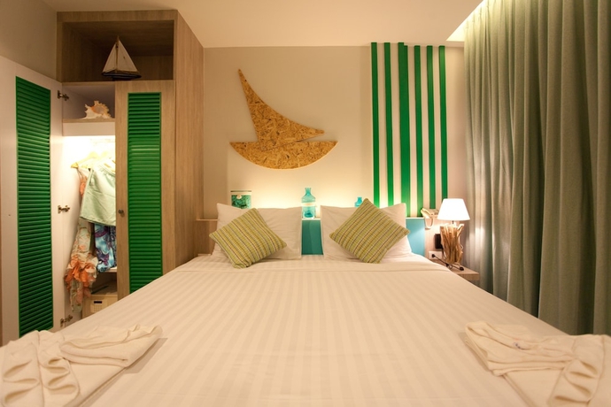 Imagen de la habitación del Hotel The Blue Pearl Kata. Foto 6