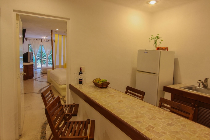 Imagen de la habitación del Hotel The Blue Pearl Suites. Foto 2