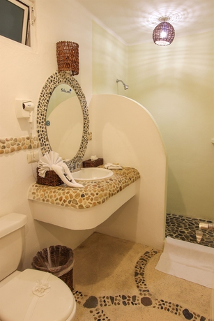 Imagen de la habitación del Hotel The Blue Pearl Suites. Foto 4