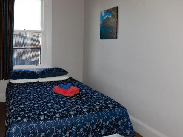 Imagen de la habitación del Hotel The Blue Pub. Foto 19