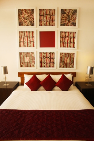 Imagen de la habitación del Hotel The Blue Water. Foto 10