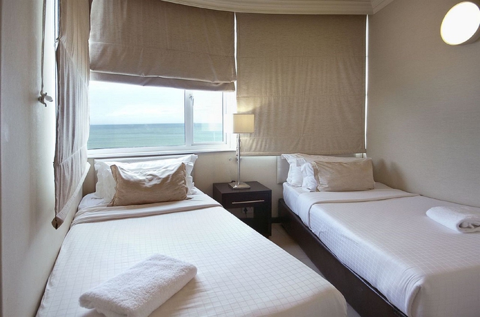 Imagen de la habitación del Hotel The Blue Waters. Foto 5