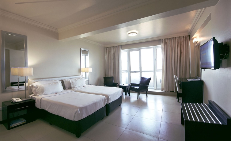 Imagen de la habitación del Hotel The Blue Waters. Foto 9