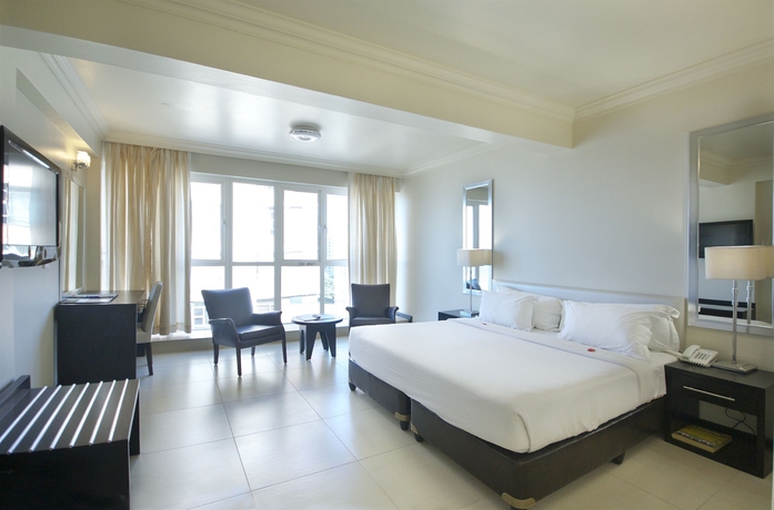 Imagen de la habitación del Hotel The Blue Waters. Foto 12