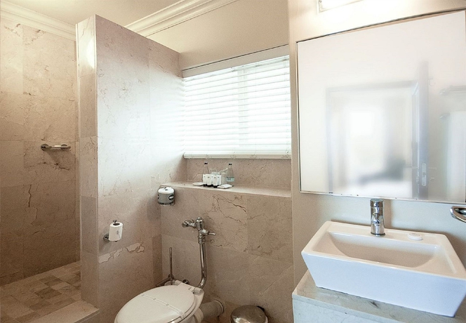 Imagen de la habitación del Hotel The Blue Waters. Foto 13