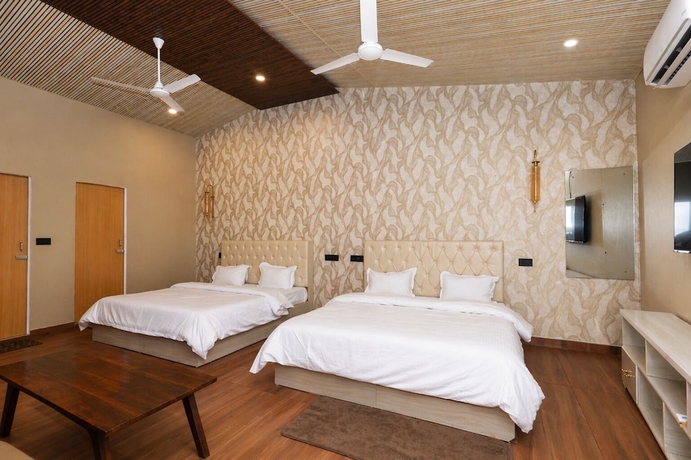 Imagen de la habitación del Hotel The Bluewind Resort. Foto 5