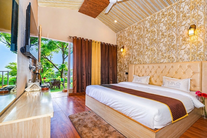 Imagen de la habitación del Hotel The Bluewind Resort. Foto 6