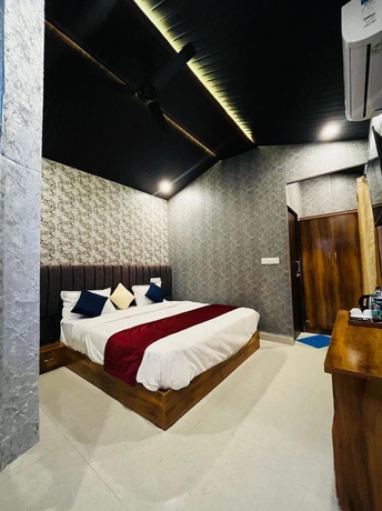 Imagen de la habitación del Hotel The Bluewind Resort. Foto 9