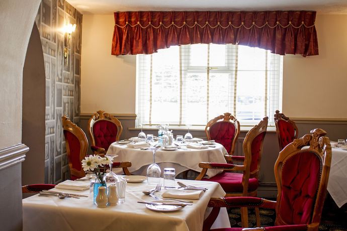 Imagen del bar/restaurante del Hotel The Boars Head. Foto 7