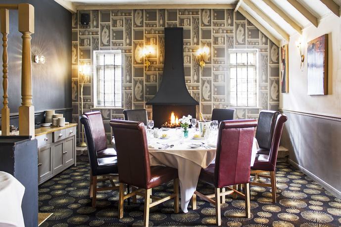 Imagen del bar/restaurante del Hotel The Boars Head. Foto 11